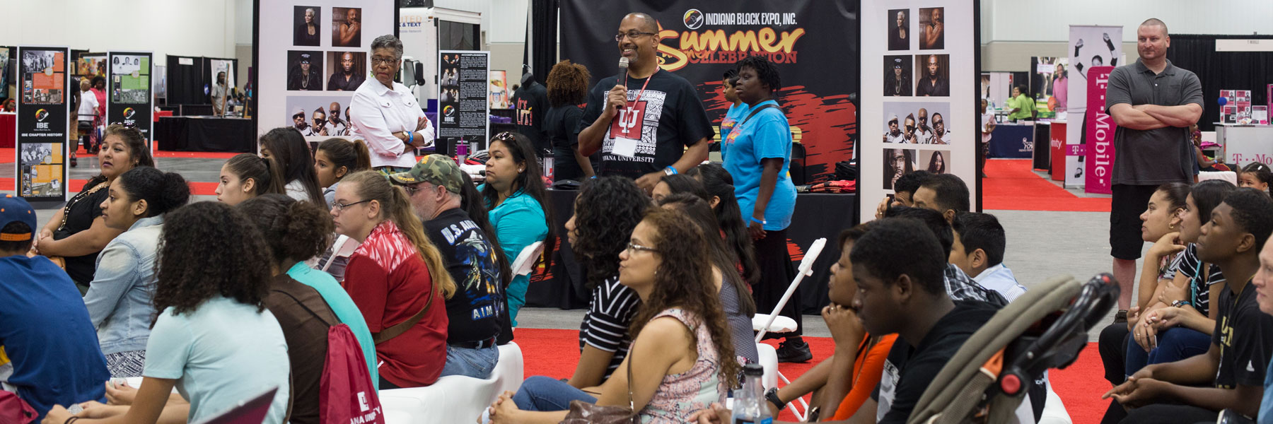 A presenter speaks to students during the Indiana Black Expo Summer Celebration. 