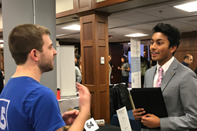 Student speaking with a recruiter at the Diversity Career Fair.