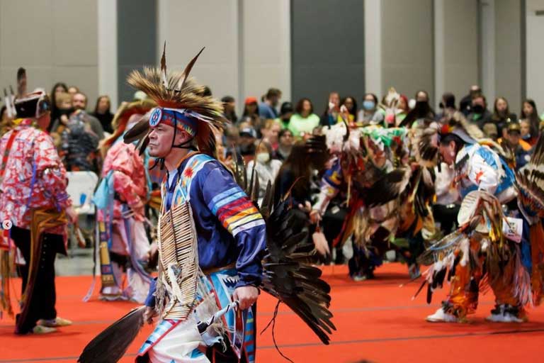 2022 IU Powwow performers inside Marching hundred hall