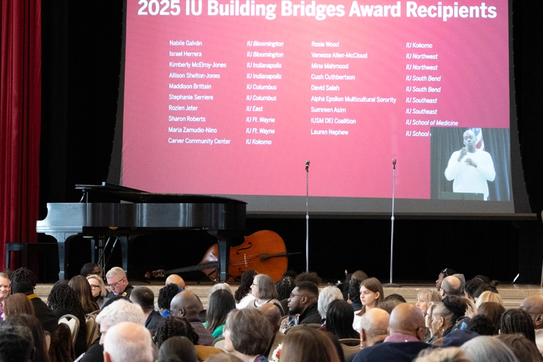 PowerPoint slide for the 2025 IU Building Bridges Award Recipients event featuring a list of awardees and their affiliations.