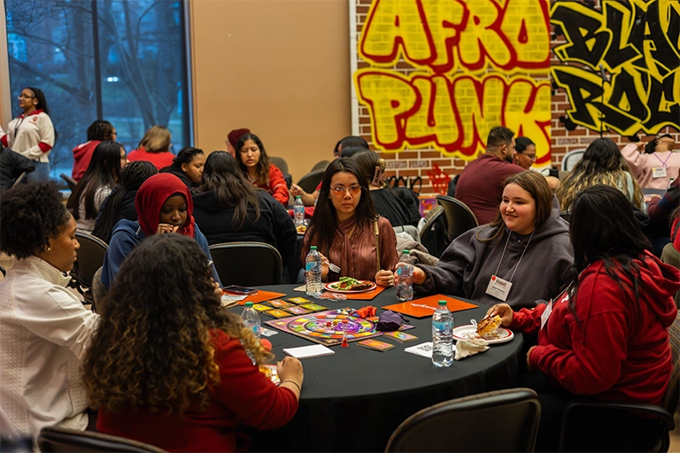 Group of attendees playing the Keep It Real game after a session.